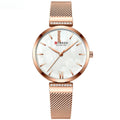 Montre à quartz simple en alliage tendance pour femme