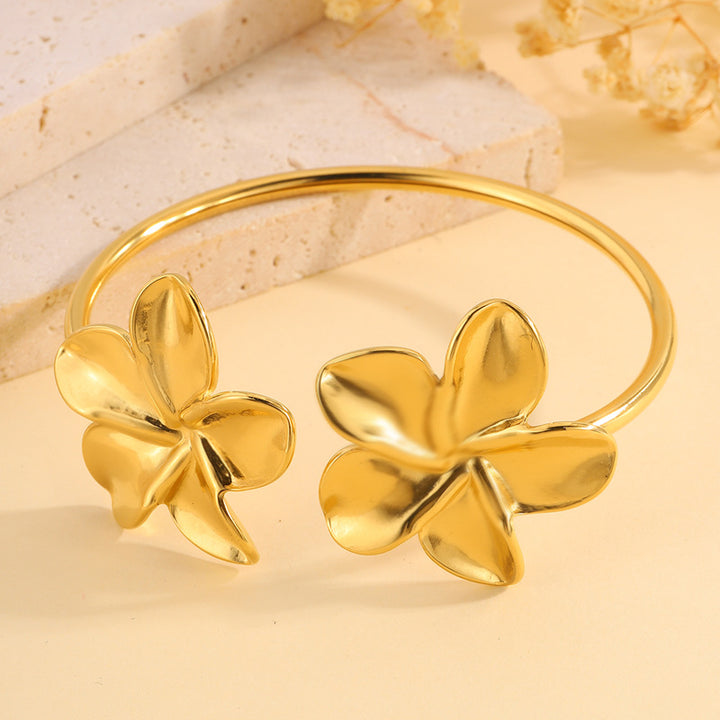 Bracelet ouvert en acier inoxydable avec fleur