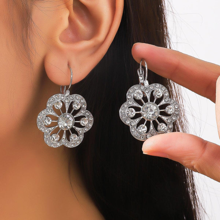 Boucles d'oreilles à fleurs rondes simples à la mode pour femmes