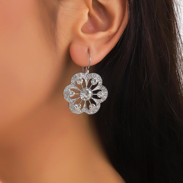 Boucles d'oreilles à fleurs rondes simples à la mode pour femmes